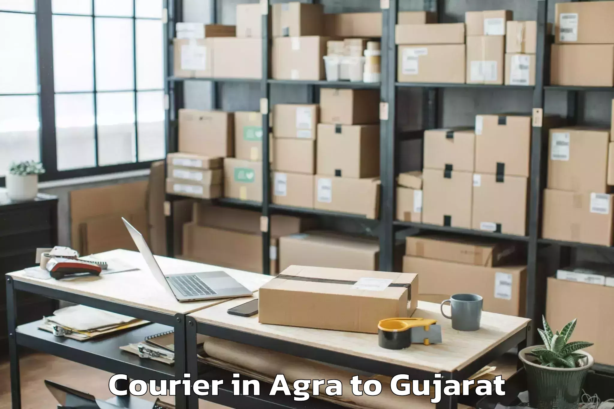 Reliable Agra to Jetpur Courier